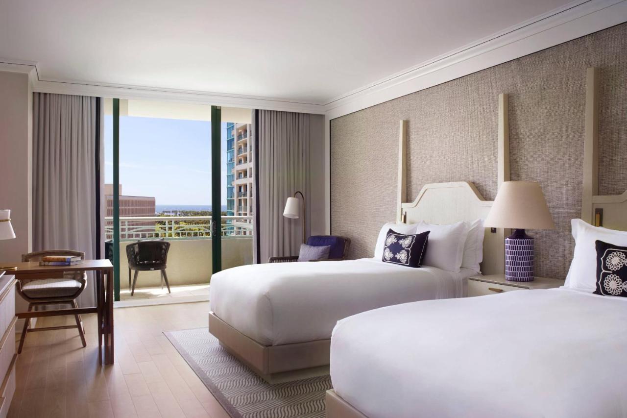 Guest Room Two Queen Beds Balcony Partial Bay View