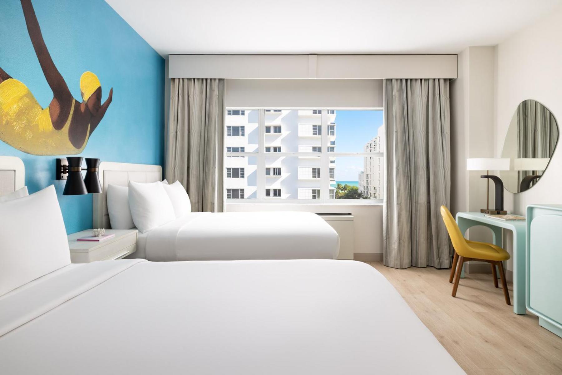 Queen Room with Two Queen Beds and Partial Ocean View,1649061937:JPEG