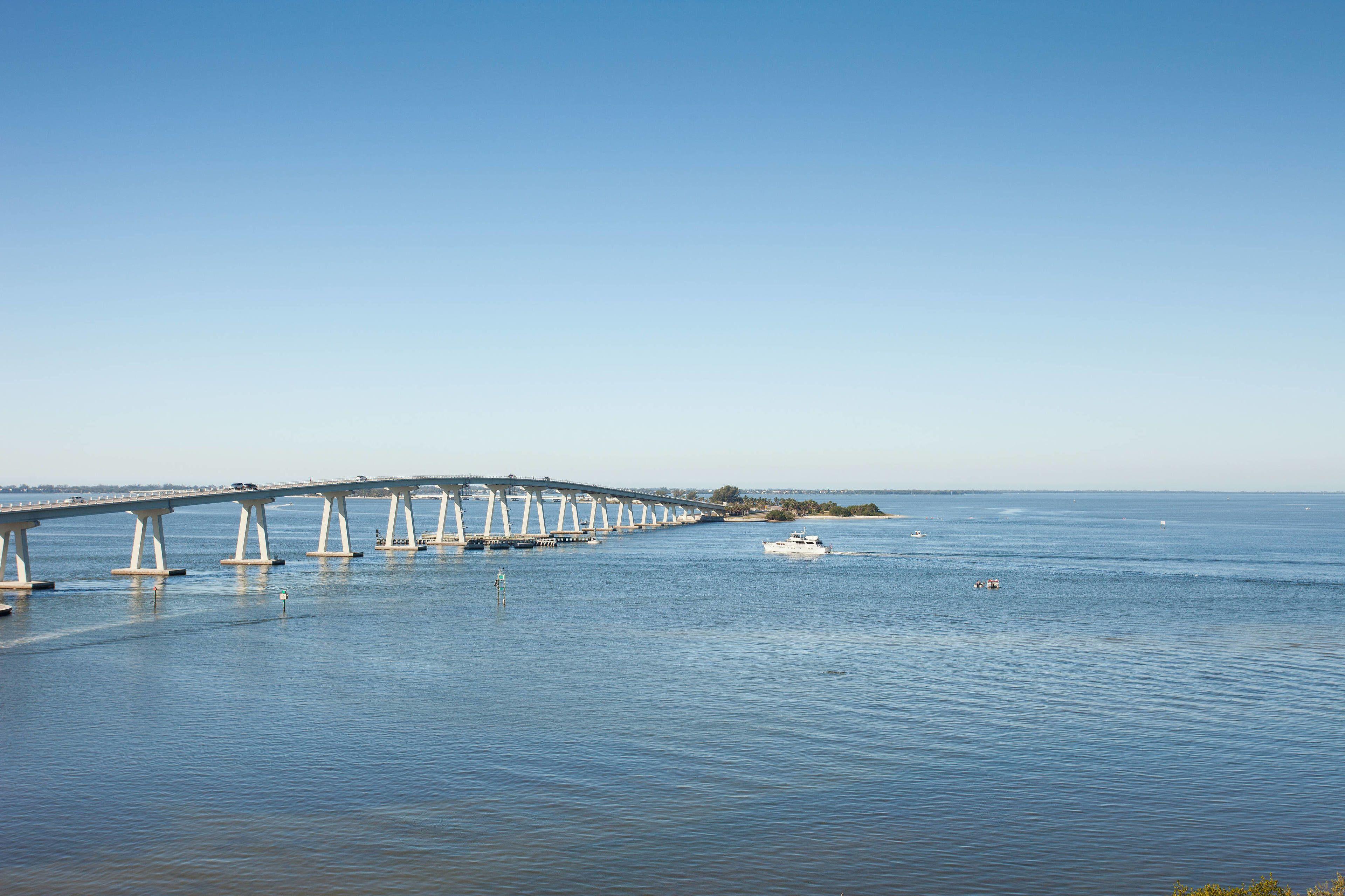 Guest room 1 King Water view Captiva Tower Balcony Mobility Accessible w or Roll Shower
