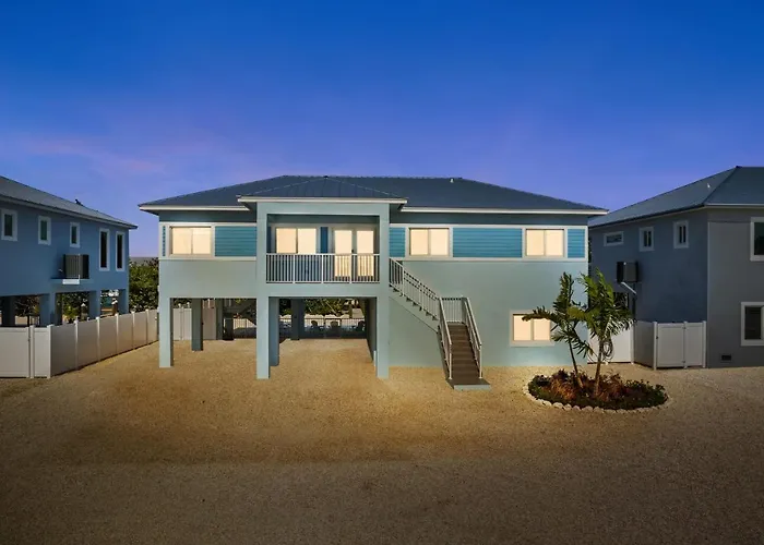 Blue Pearl New Waterfront Haven With Heated Pool ,70 Foot Dock, And More!