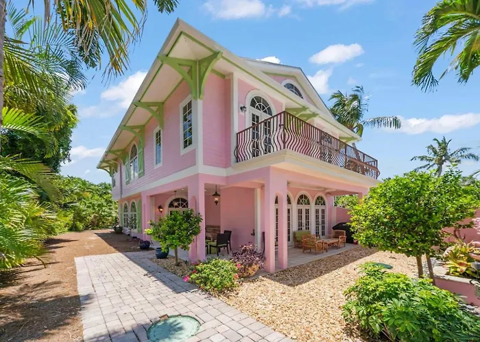 Waterfront Pink House With Private Dock & Pool