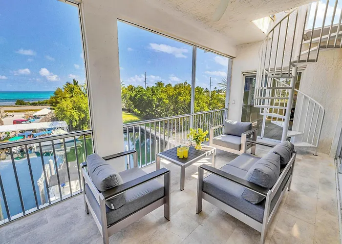 Ocean View Penthouse Retreat Amenities: Tennis Court Heated Pool Vista Key Two