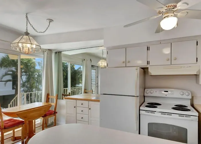 One Bedroom Condo With Waterfront Balcony And Coastal Breezes