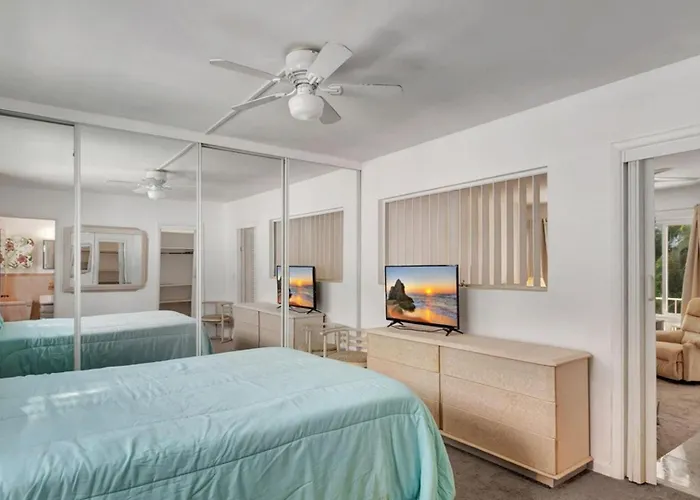 One Bedroom Condo With Waterfront Balcony And Coastal Breezes